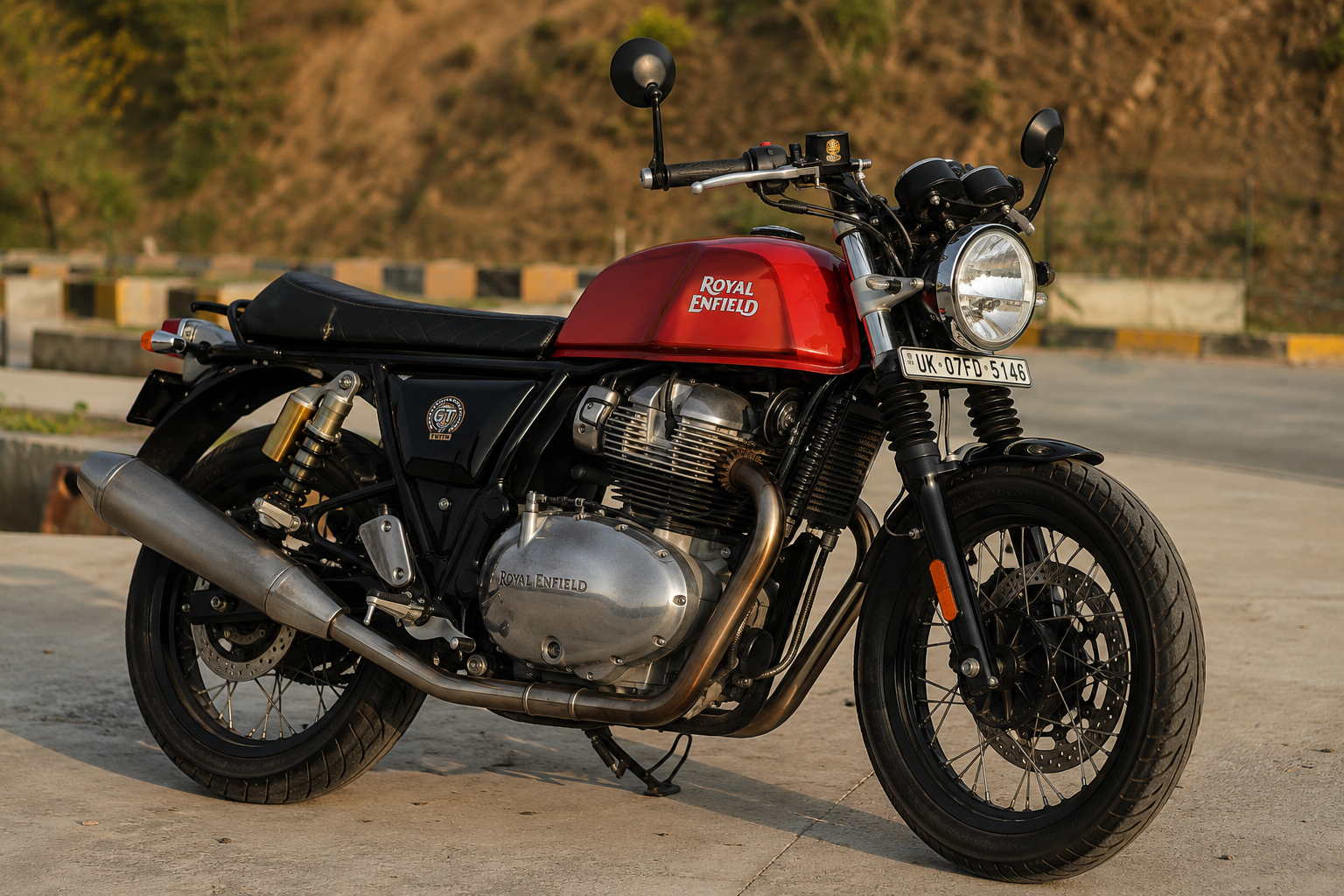 Red Royal Enfield Continental GT 650 parked outdoors in ultra HD.