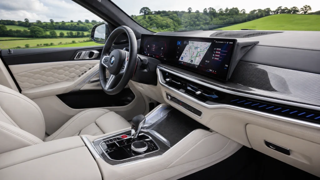 BMW X6 luxury interior with digital dashboard and navigation display